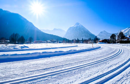 mountains at the village perstisau in austria in winterの写真素材