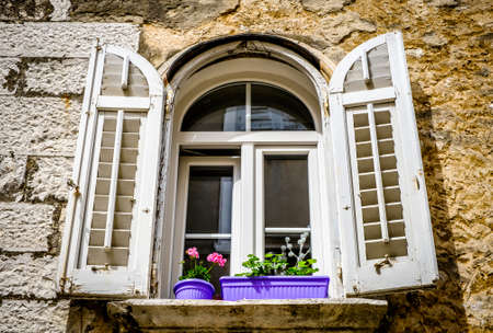 old window at a historic buildingの写真素材