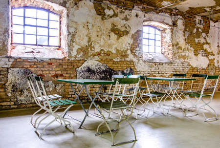 chairs and table at an old restaurantの写真素材