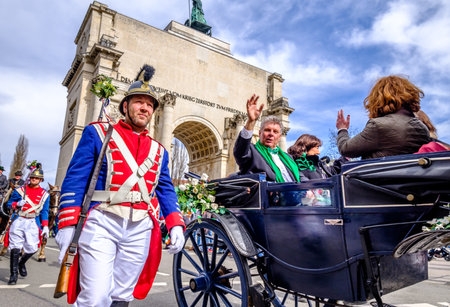 MUNICH - MARCH 11: People celebrating the annual national irish holiday St. Patricks day marching in the old town in munich, germany on  March 11, 2018のeditorial素材