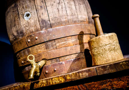 Old beer cask and hammerの写真素材