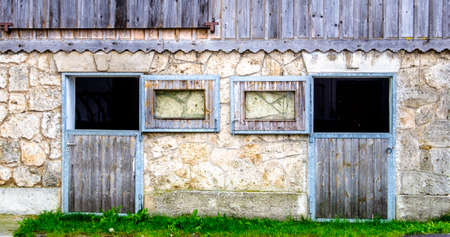 door at an old stableの写真素材