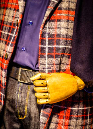 old wooden mannequin hand with jeansの写真素材