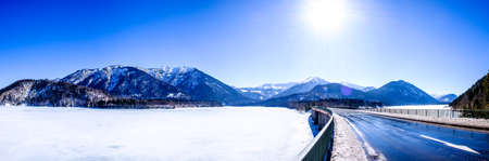 country road at the sylvenstein lake - bavariaの写真素材