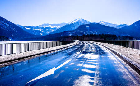 country road at the sylvenstein lake - bavariaの写真素材