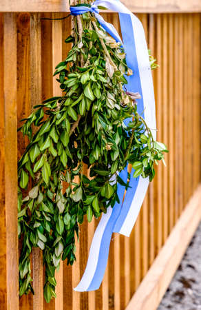 sticks decorated with various twigs for palm sunday processionsの写真素材