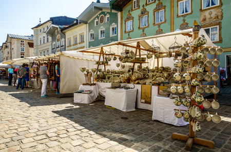 BAD TOELZ, GERMANY - APRIL 21: people visiting the traditional art market with kiosks in the old town on april 21, 2018 in Bad Toelz, Germanyのeditorial素材