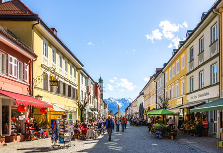 MURNAU, GERMANY - APRIL 4: some people visiting the famous old town called untermarkt on april 4, 2018 in murnau, Germanyのeditorial素材