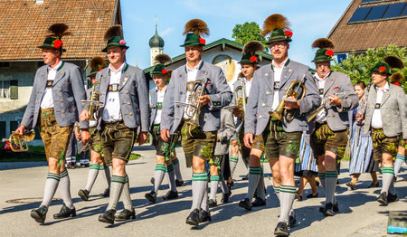 BICHL, GERMANY - MAY 13: a typical traditional bavarian parade for the 125th anniversary of the fire department in bichl, germany on may 13, 2018のeditorial素材