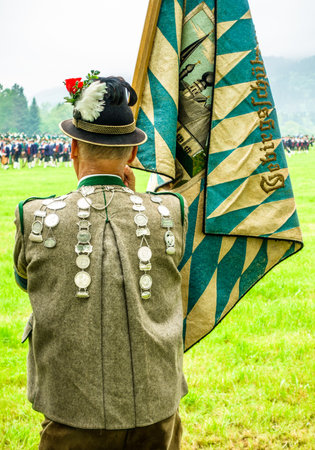 BICHL, GERMANY - MAY 6: a typical traditional bavarian parade for a saints day, called patronatstag, with 4000 gunmen in bichl, germany on may 6, 2018のeditorial素材