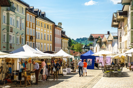BAD TOELZ, GERMANY - APRIL 21: people visiting the traditional art market with kiosks in the old town on april 21, 2018 in Bad Toelz, Germanyのeditorial素材