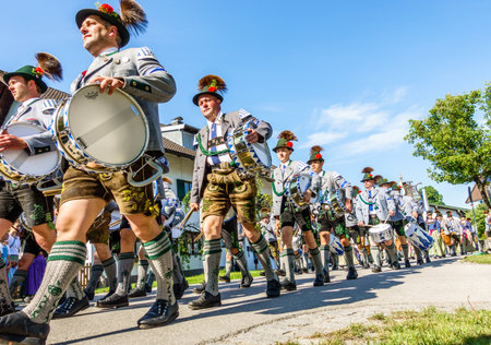 BICHL, GERMANY - MAY 13: a typical traditional bavarian parade for the 125th anniversary of the fire department in bichl, germany on may 13, 2018のeditorial素材