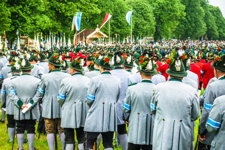 BICHL, GERMANY - MAY 6: a typical traditional bavarian parade for a saints day, called patronatstag, with 4000 gunmen in bichl, germany on may 6, 2018のeditorial素材