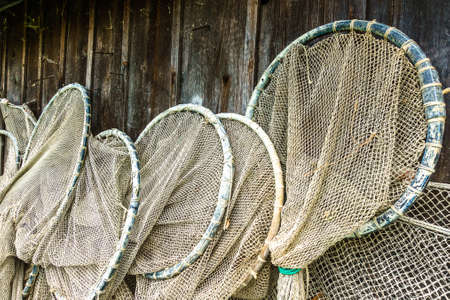 old fishing net at a harborの写真素材