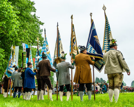 BICHL, GERMANY - MAY 6: a typical traditional bavarian parade for a saints day, called patronatstag, with 4000 gunmen in bichl, germany on may 6, 2018のeditorial素材