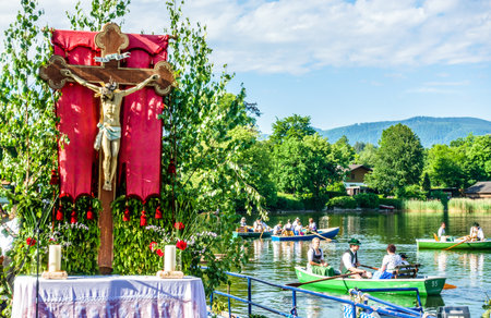 Seehausen, Germany - May 31: a special bavarian corpus christi procession in Seehausen, germany, where the faithful use boats for part of the route on may 31, 2018のeditorial素材