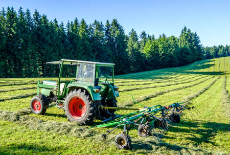 old tractor at a fieldの写真素材