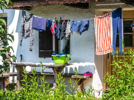drying washing at a backyardの写真素材
