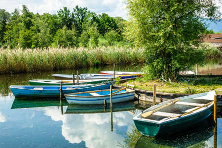 old wooden rowboats in austriaの写真素材