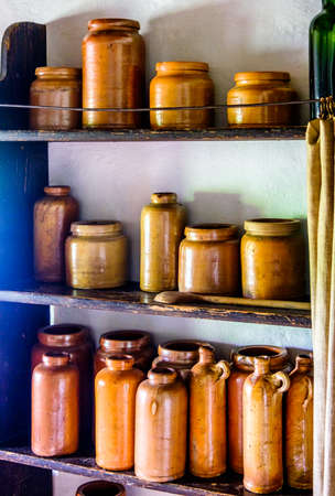 old bottles on a shelfの写真素材