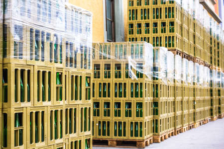 wine bottles in plastic boxesの写真素材