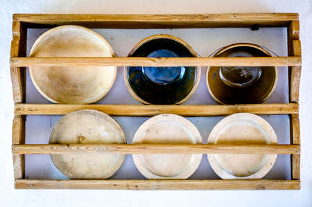old wooden rack with dishware