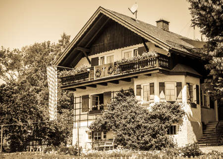 typical old farmhouse at the european alpsの写真素材