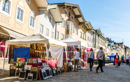 BAD TOELZ, GERMANY - APRIL 21: people visiting the traditional art market with kiosks in the old town on april 21, 2018 in Bad Toelz, Germanyのeditorial素材
