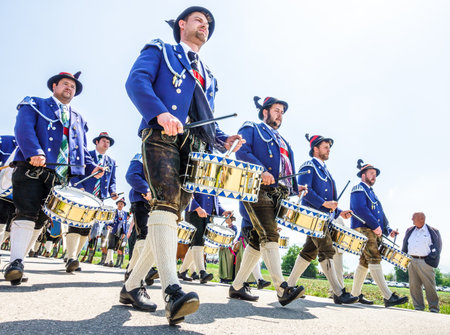 BICHL, GERMANY - MAY 6: a typical traditional bavarian parade for a saints day, called patronatstag, with 4000 gunmen in bichl, germany on may 6, 2018のeditorial素材