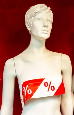 mannequin with sale tape - photoの写真素材