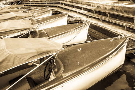 old electric boats at a lakeの写真素材