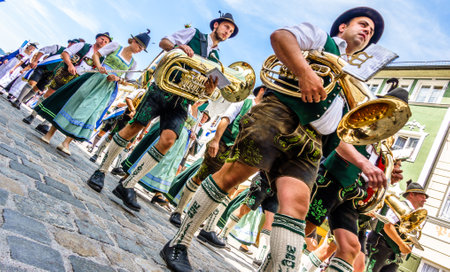 Bad Toelz, Germany - July 29: pageant with typical bavarian costumes at the gaufest in the historic town on july 29, 2018 in Bad Toelz, Germanyのeditorial素材