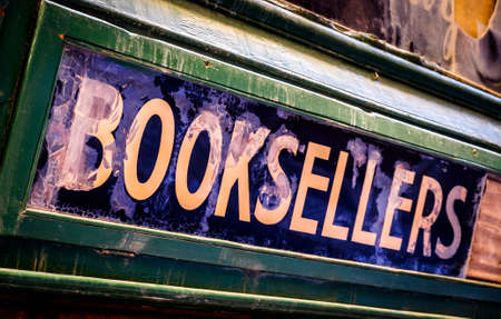old booksellers sign at a ruin