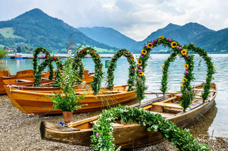 decorated pageant boats at the schliersee lake -bavariaの写真素材