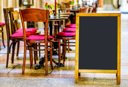 tables and chairs at an old cafe