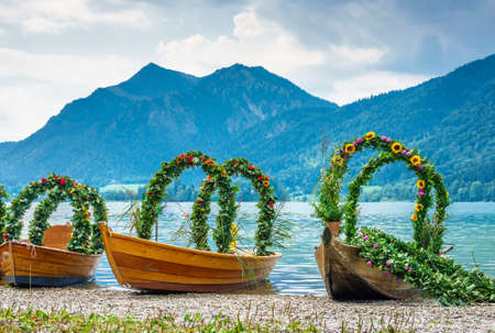 decorated pageant boats at the schliersee lake -bavariaの写真素材