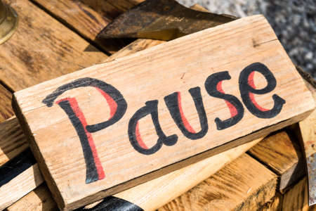 old wooden pause sign - photoの写真素材