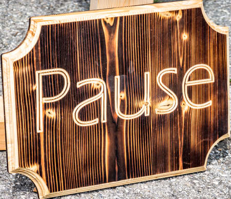 old wooden pause sign - photoの写真素材