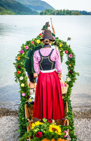 Schliersee, Germany - August, 5: bavarian participants with traditional clothes at the pageant for the sankt sixtus in schliersee on August 5, 2018のeditorial素材