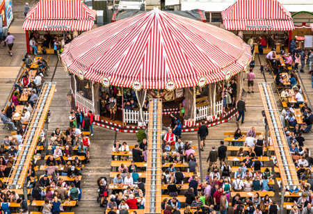 Munich, Germany - October 7: famous beer tent and people at the biggest folk festival in the world - the oktoberfest on oktober 7, 2018 in munich.のeditorial素材