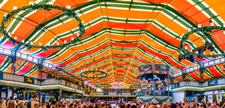 Munich, Germany - October 1: famous beer tent called Marstall and people at the biggest folk festival in the world - the oktoberfest on oktober 1, 2018 in munich.のeditorial素材