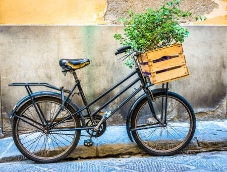old bike at an old town in austriaの写真素材
