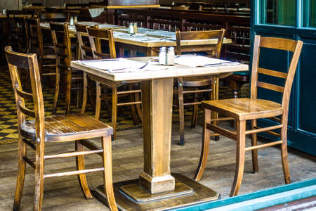 typical sidewalk restaurant in italyの写真素材