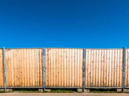 wooden hoarding wall at a construction site