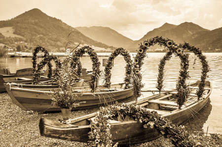 decorated pageant boats at the schliersee lake -bavariaの写真素材