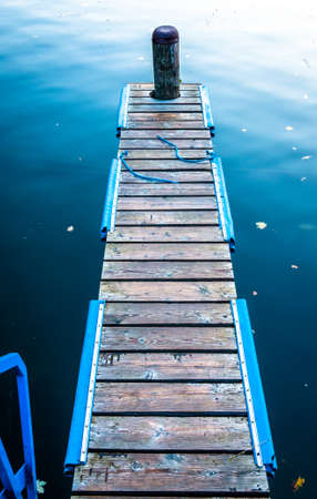 old wooden jetty at a lakeの写真素材