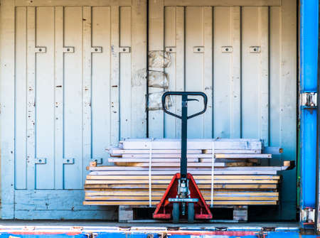 low lift truck and a container