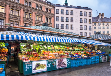 Munich, Germany - December 12: View of Viktualienmarkt a sunny day. It is a daily food market and a square in the center of Munich near Marienplatz on december 12, 2018のeditorial素材