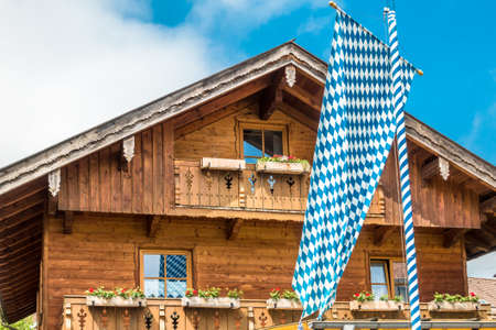 typical bavarian farmhouse at the european alps