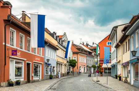 Murnau, Germany - July 8: some people visiting the famous old town called untermarkt on July 8, 2018 in murnau, Germanyのeditorial素材
